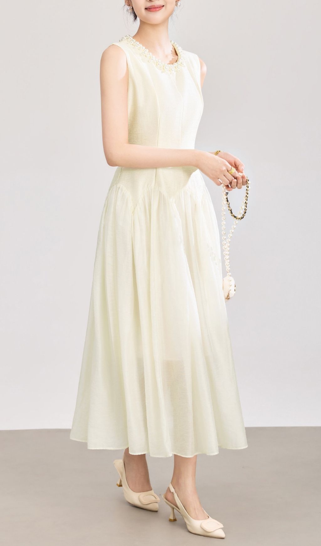 e4a6322d5e70fe8d4cab169ec8ff322f Sleeveless Midi Dress With Tulle Skirt And Pearl Embellished Collar