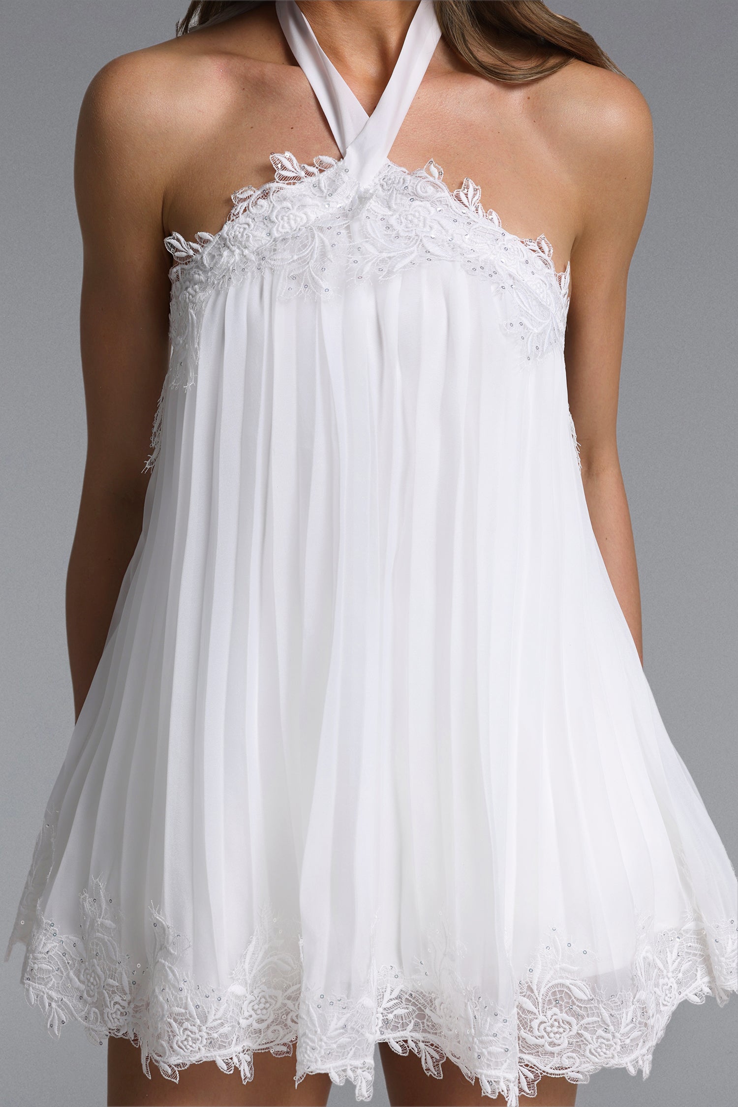 White Halter Neck Lace Trim Pleated Chiffon Mini Babydoll Dress - OWNCI White Halter Neck Lace Trim Pleated Chiffon Mini Babydoll Dress - OWNCI