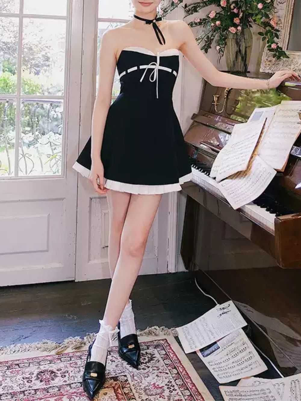 a1ba264fc4344be800a893677de424a4 Malle Black Strapless Bow Mini Dress