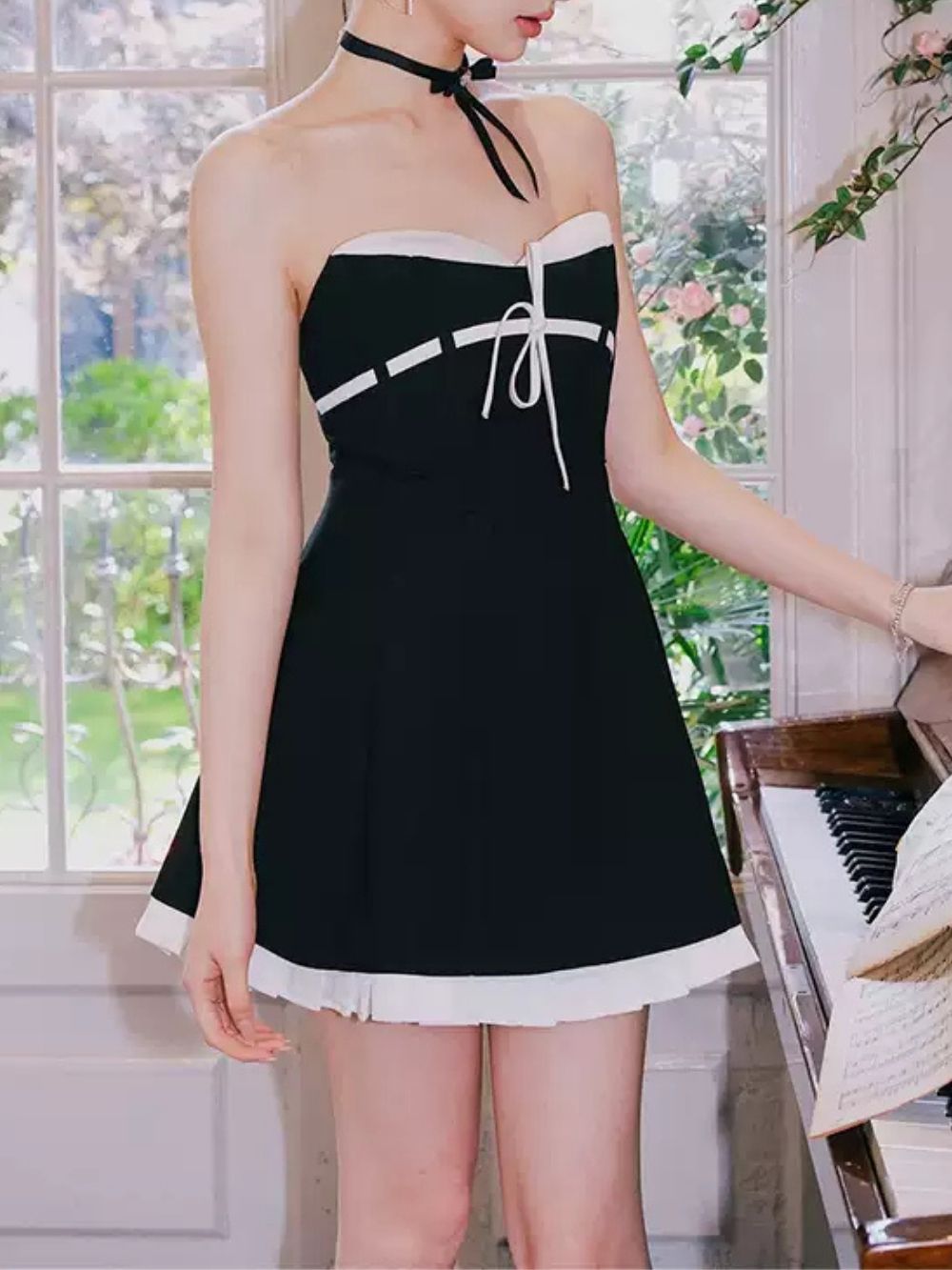 d42e8614cd8d6610aab63db79a0a8176 Malle Black Strapless Bow Mini Dress