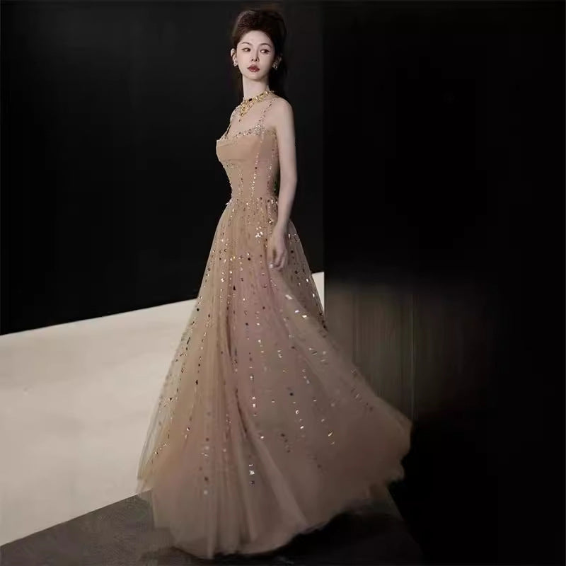 Nicola’s elegant backless halter maxi dress – Champagne - OWNCI Nicola’s elegant backless halter maxi dress – Champagne - OWNCI